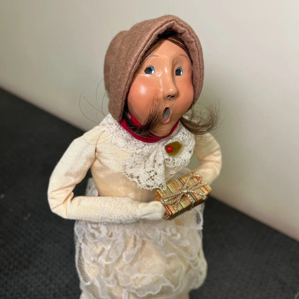 Byers Choice Caroler Woman holding Present, White‎ Dress, Long Brown Hair, 1993
